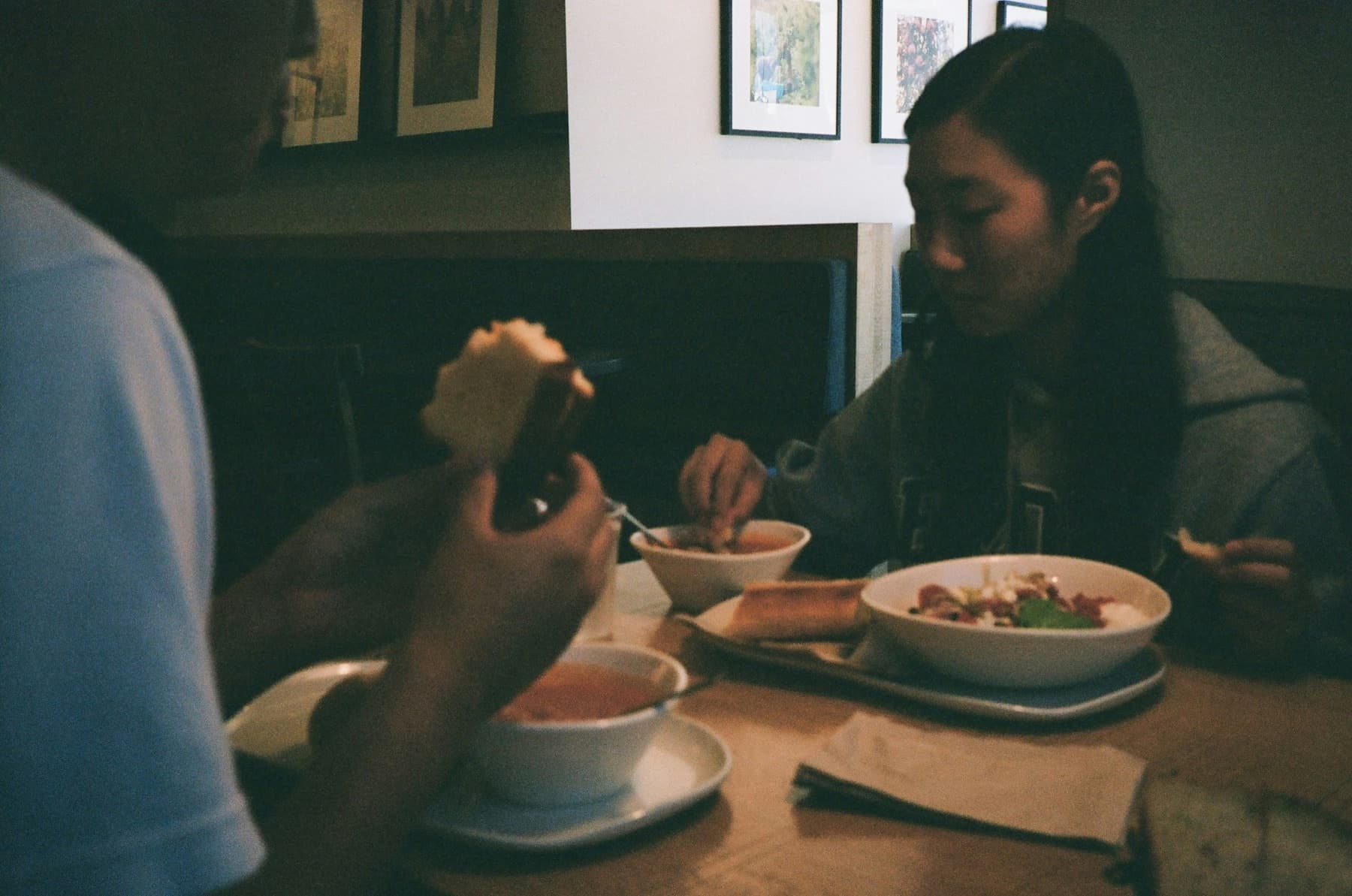 Two people sharing lunch at a neighbourhood restaurant